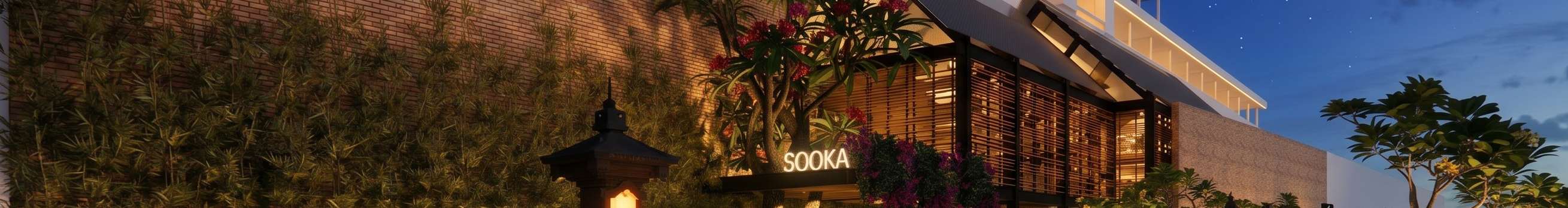 SOOKA entrance at blue hour with warm interior glow.